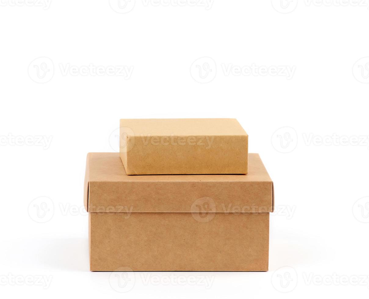 two brown cardboard boxes on a white background photo