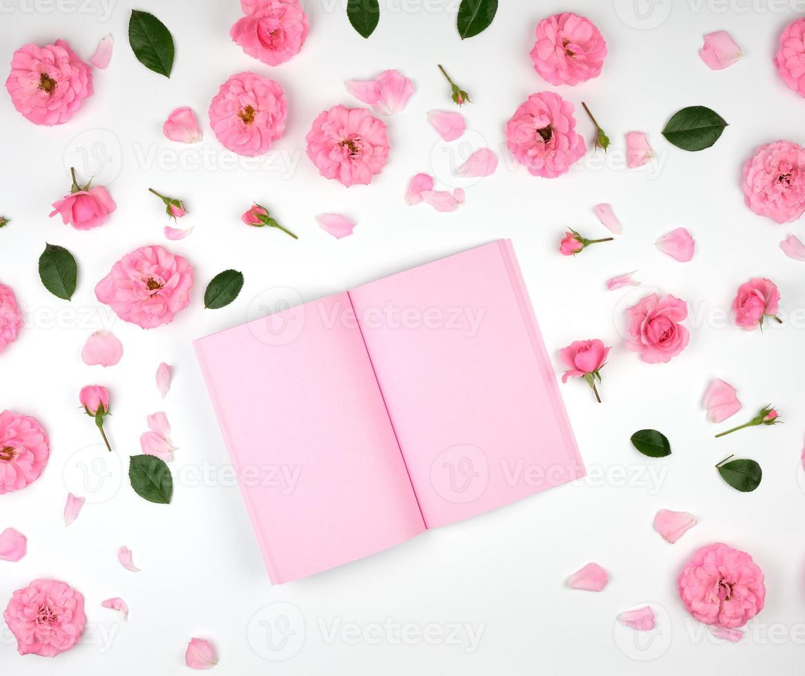 open notebook with pink blank pages photo