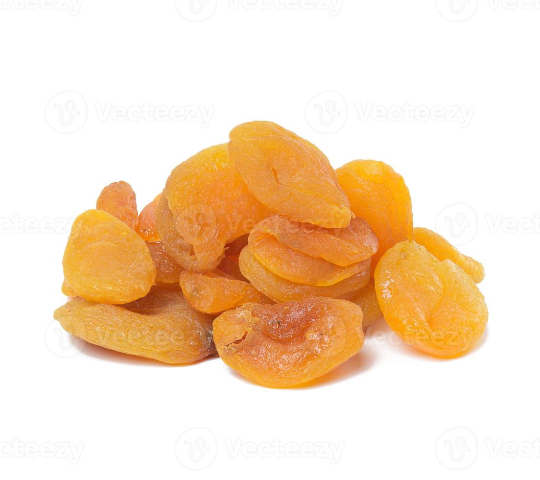 Bunch of dried apricots isolated on white background photo