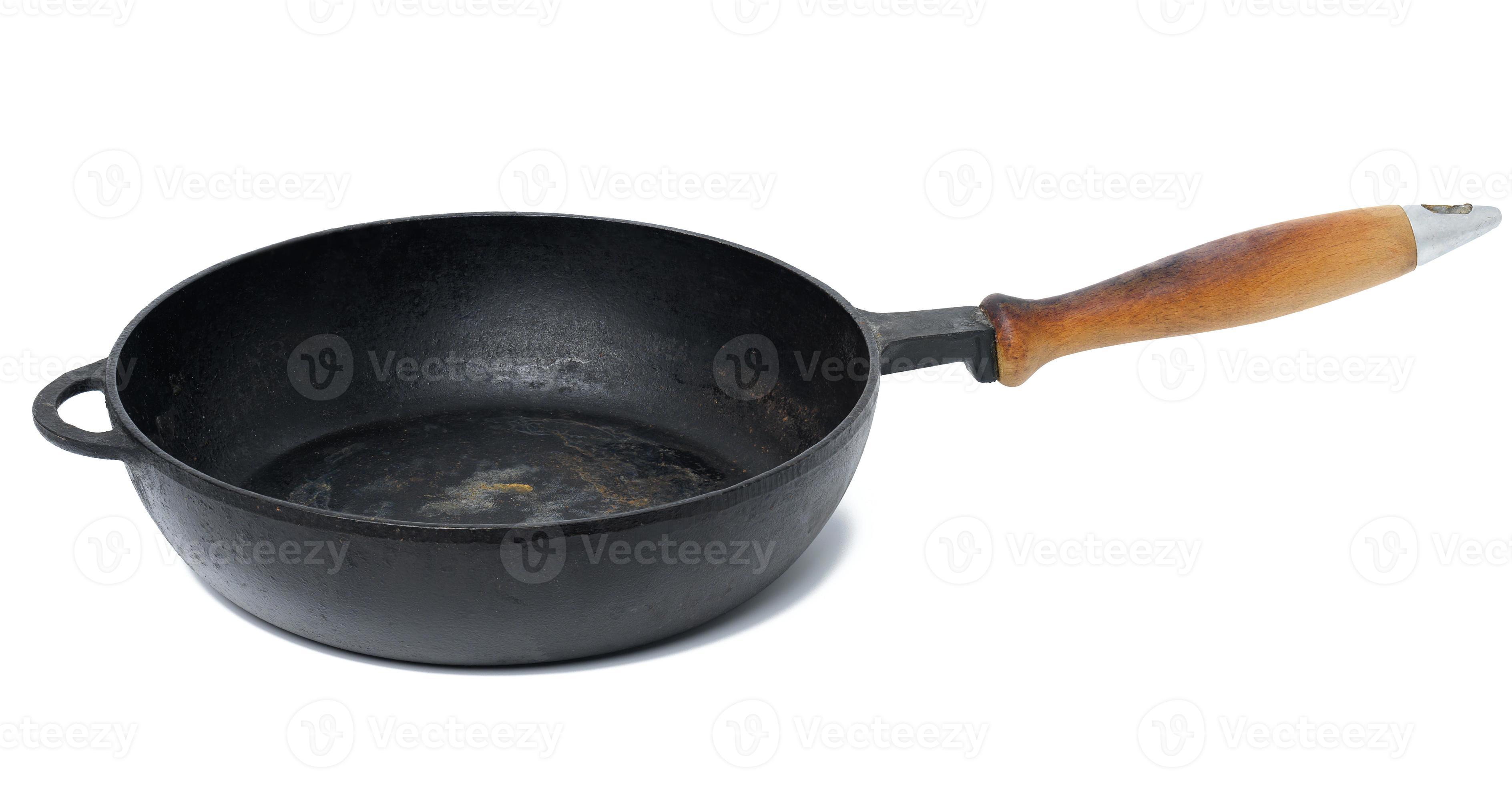 Empty black round metal pan on a white isolated background 18958706