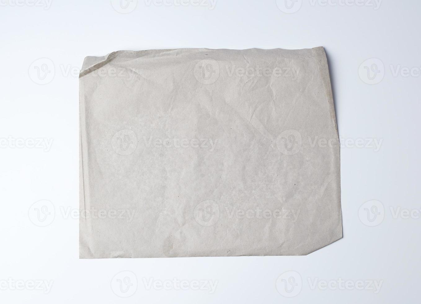 empty gray crumpled sheet of paper, full frame photo