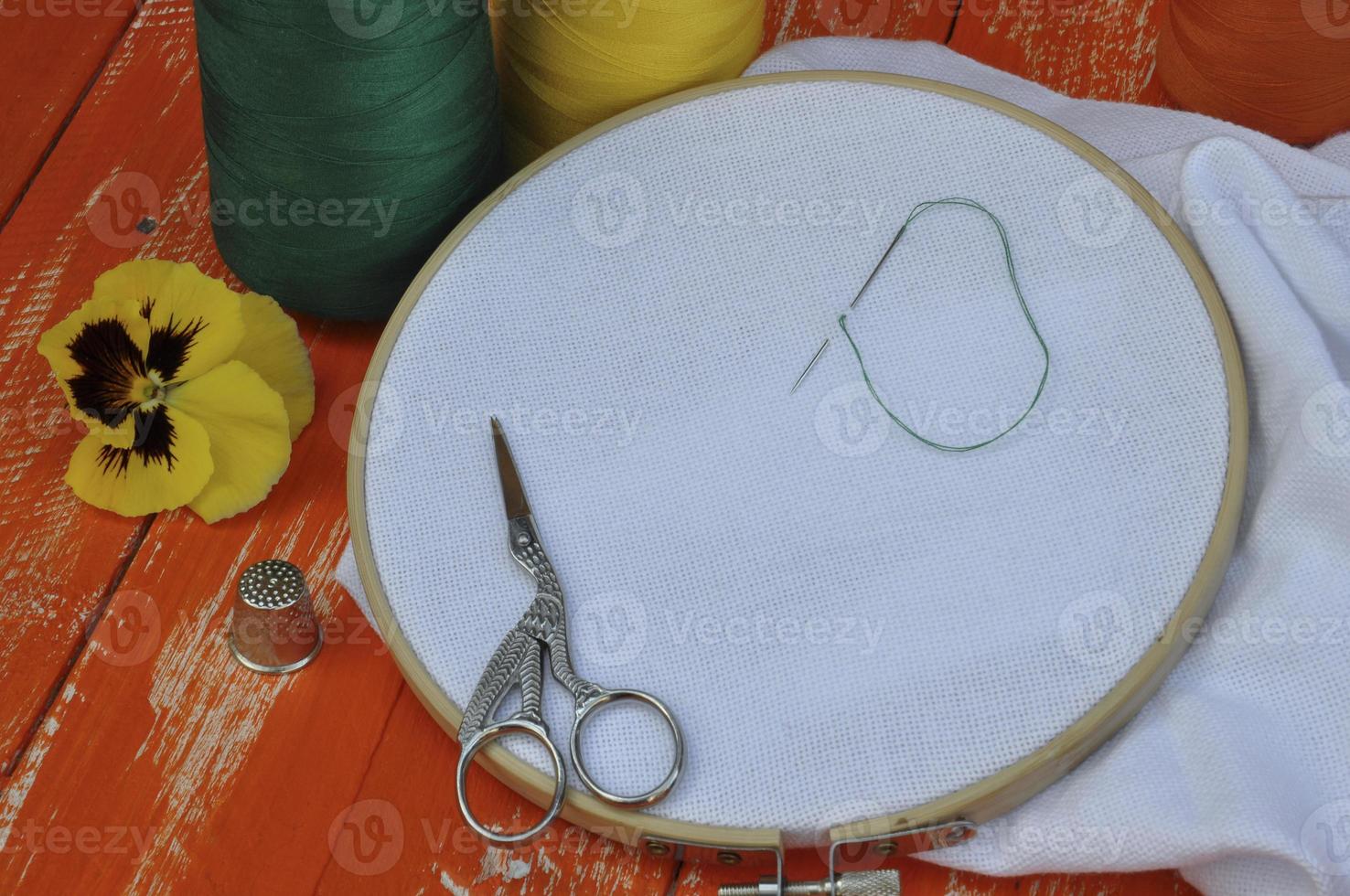 White fabric for the embroidery hoop photo