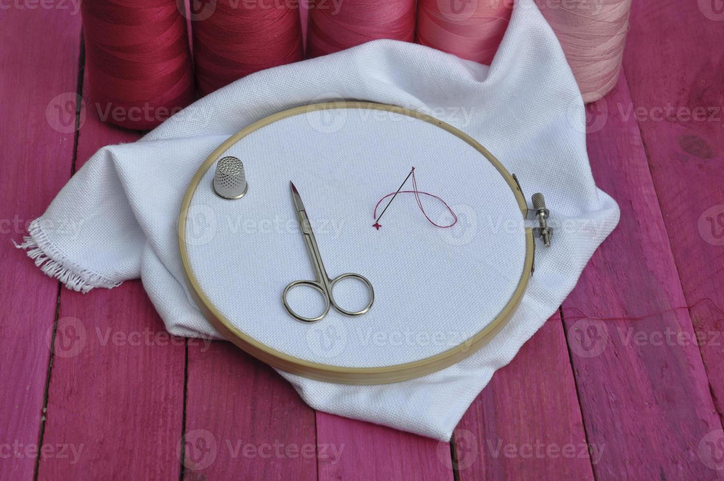 stylized photo of objects for needlework in purple tones