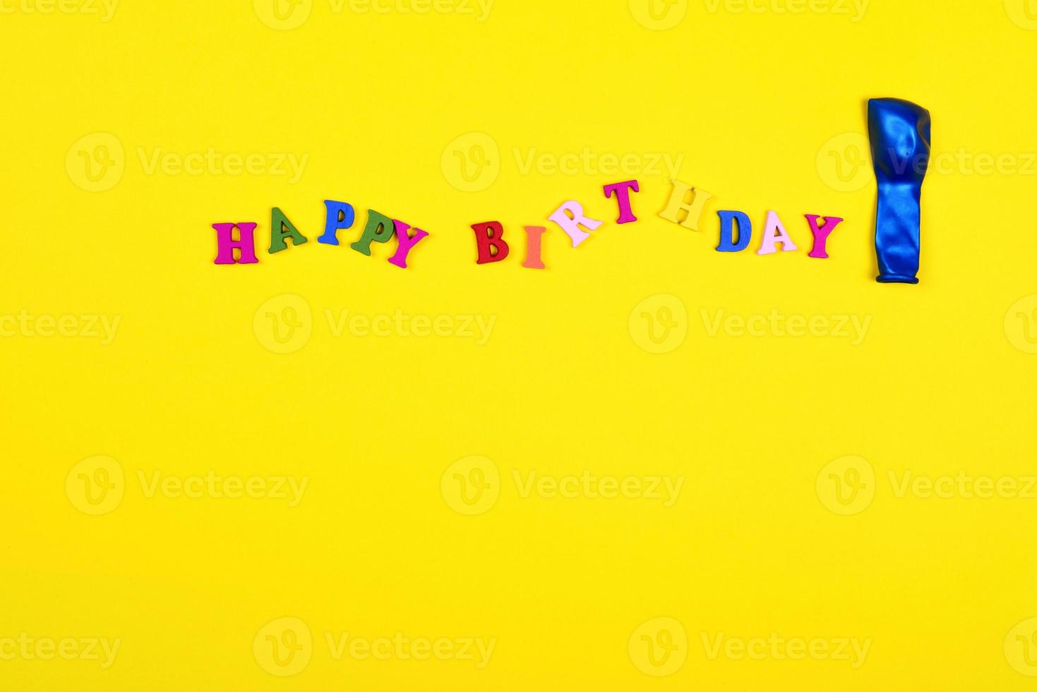 Yellow abstract background with the word  happy birthday photo