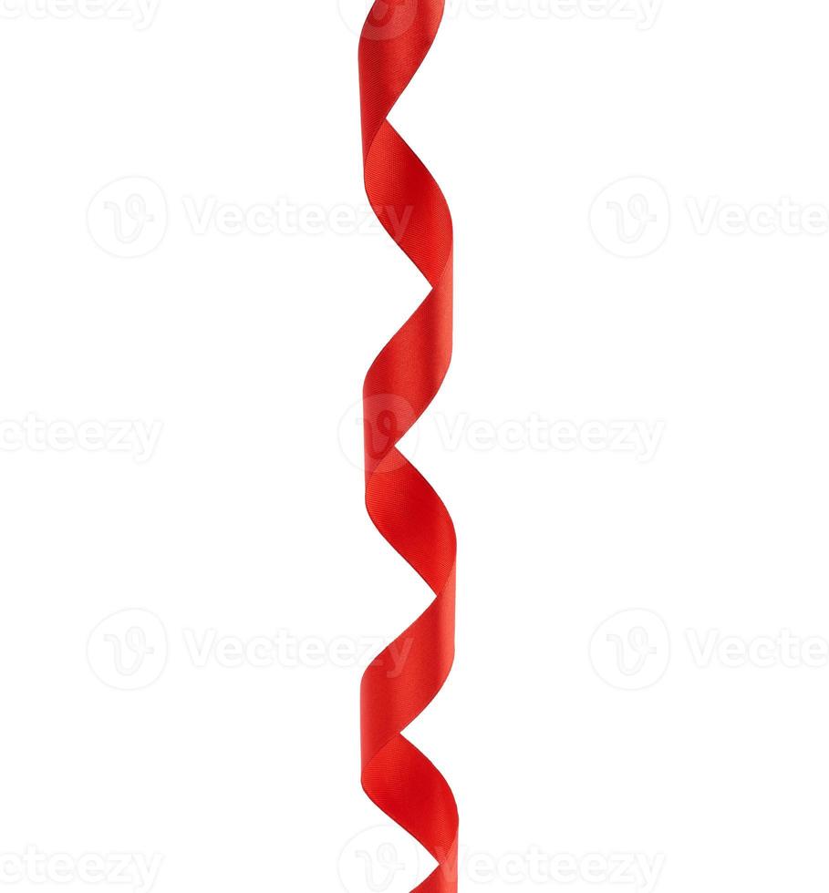 curled red satin ribbon isolated on white background photo