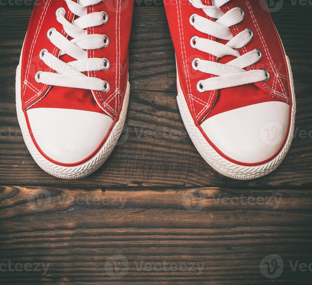 pair of red textile sneakers photo