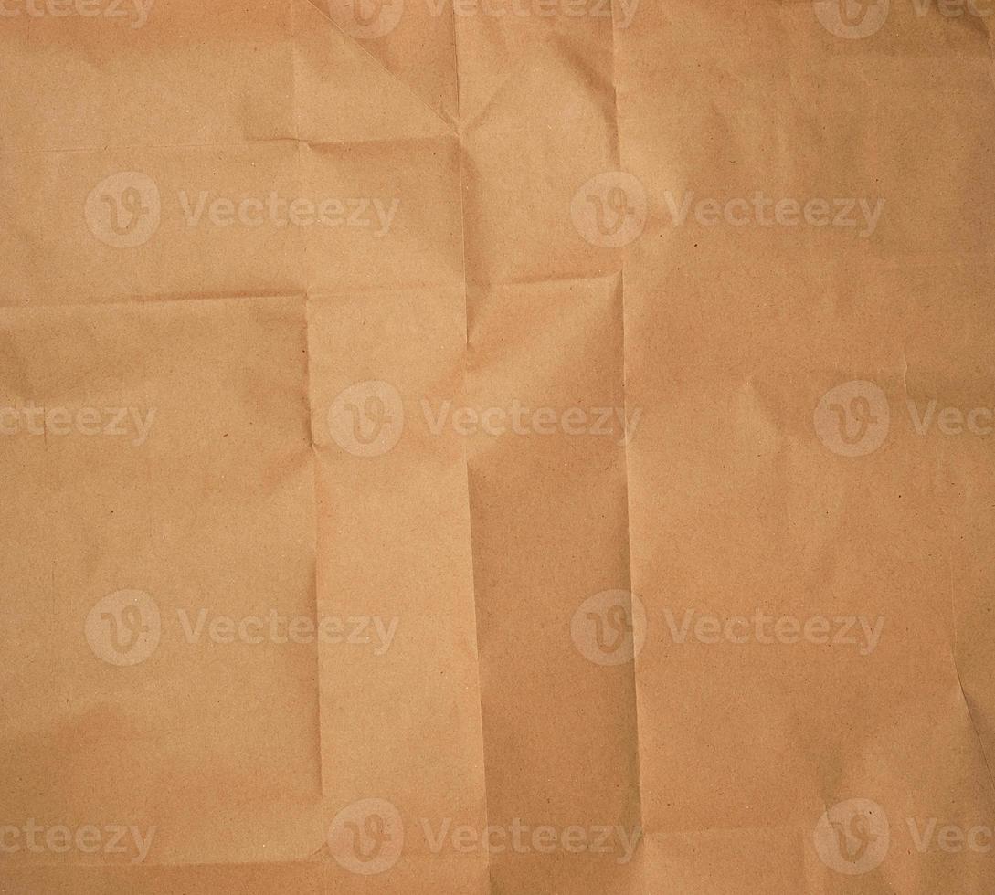 crumpled brown sheet of paper, full frame photo