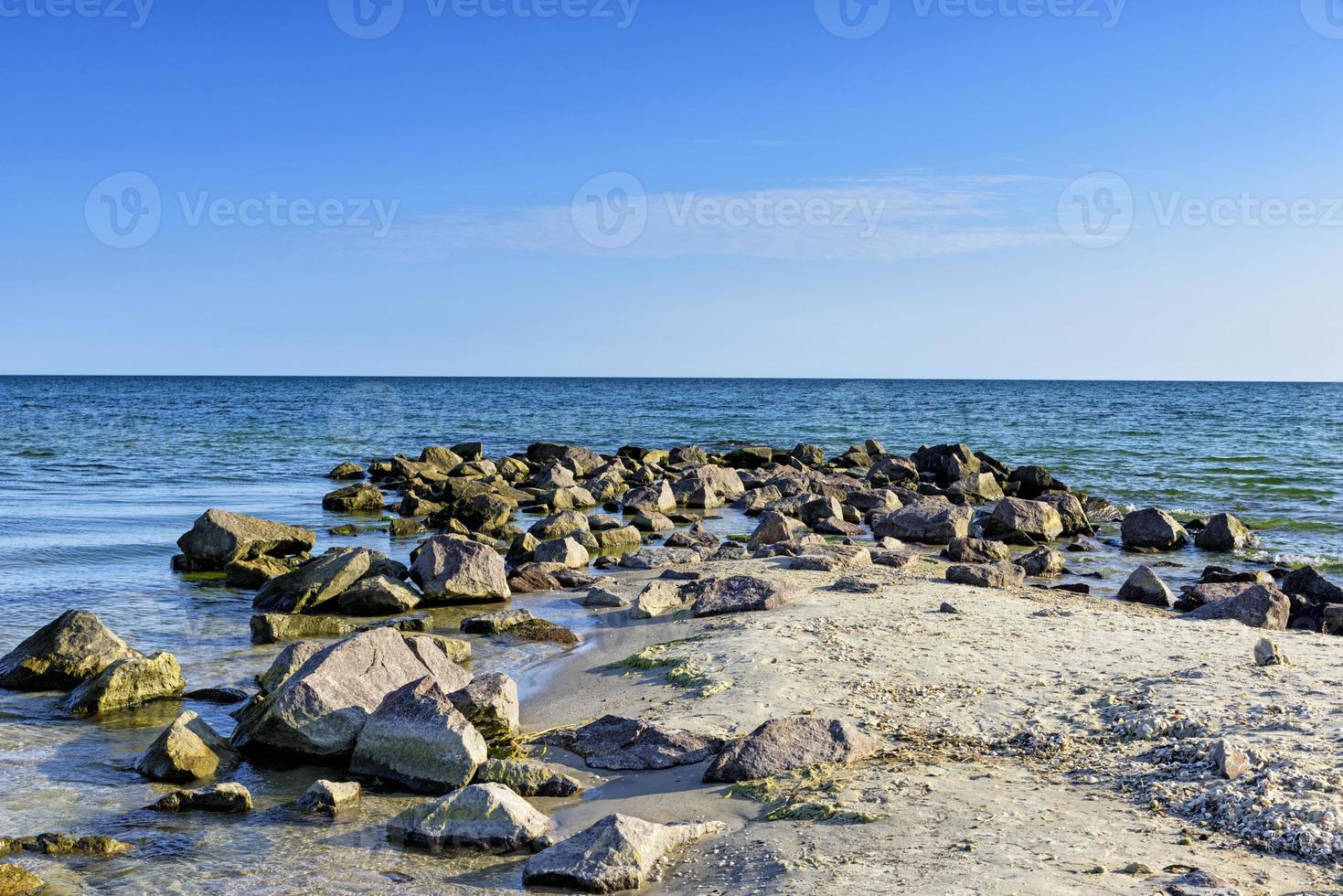 View of the Black Sea with large stones on a summer sunny day, Kherson photo
