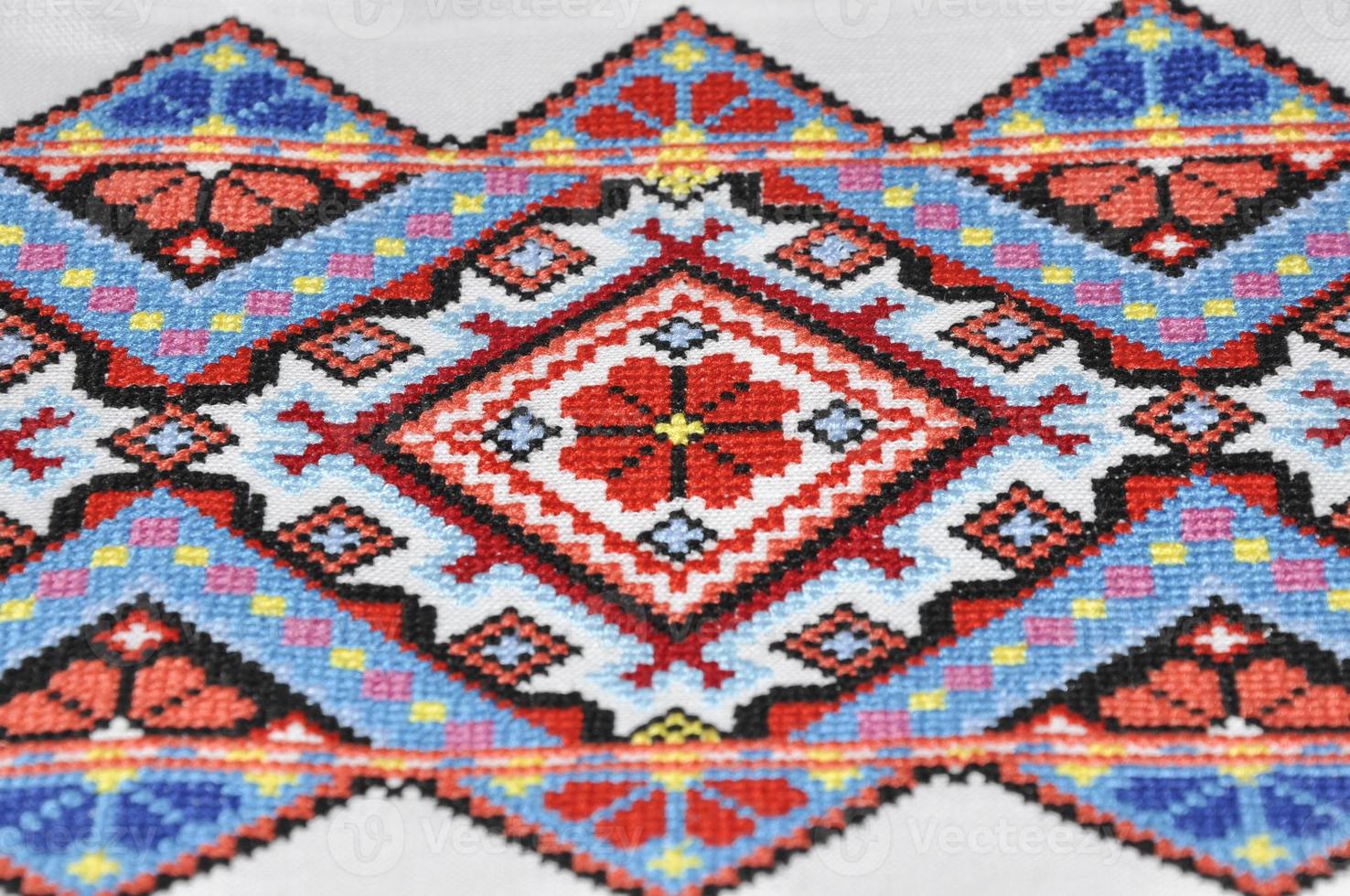 Geometric pattern embroidered cross photo