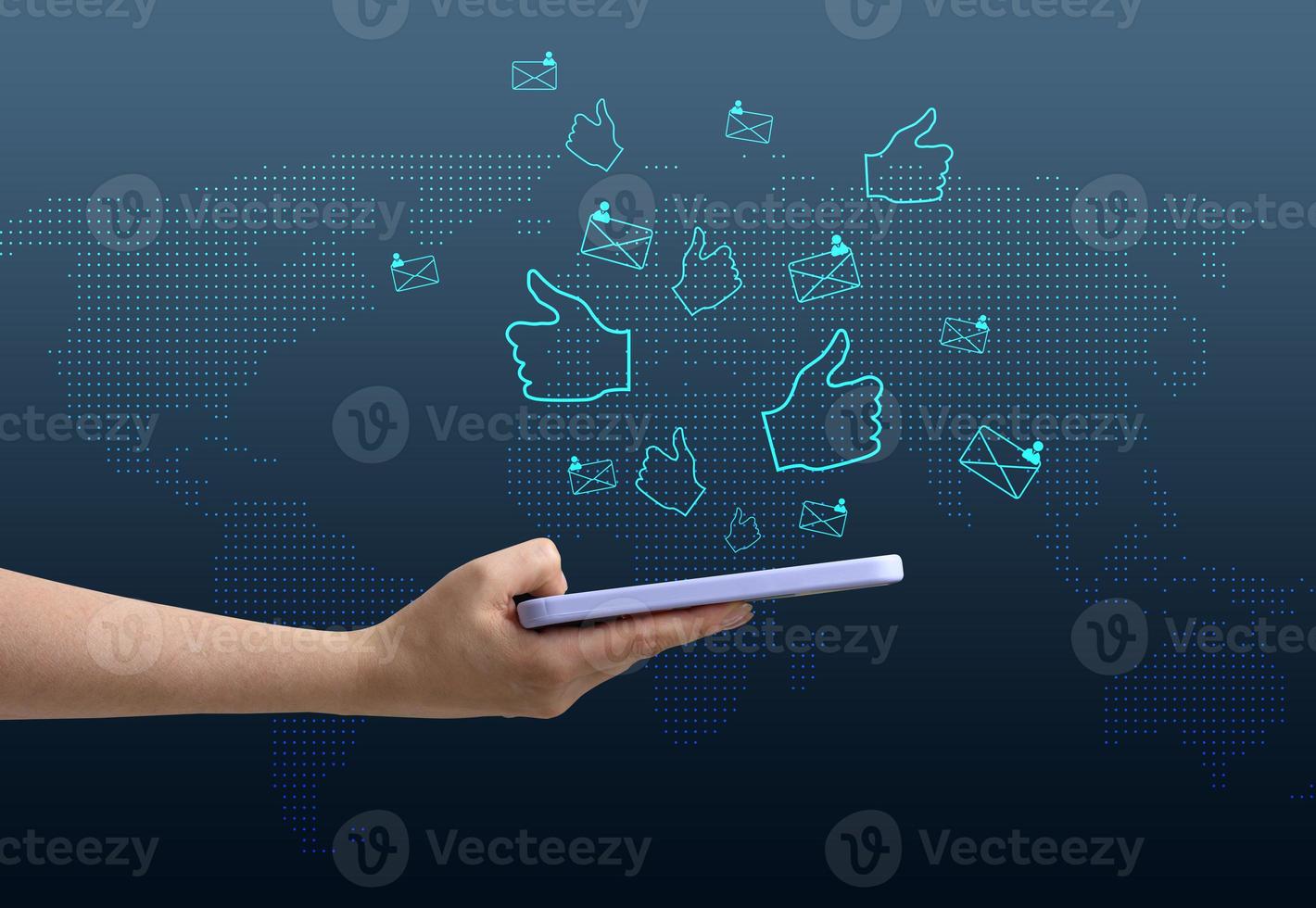 Mobile phone notifications for published news, likes and comments in the global social network. A woman's hand holds a phone on a blue background. photo
