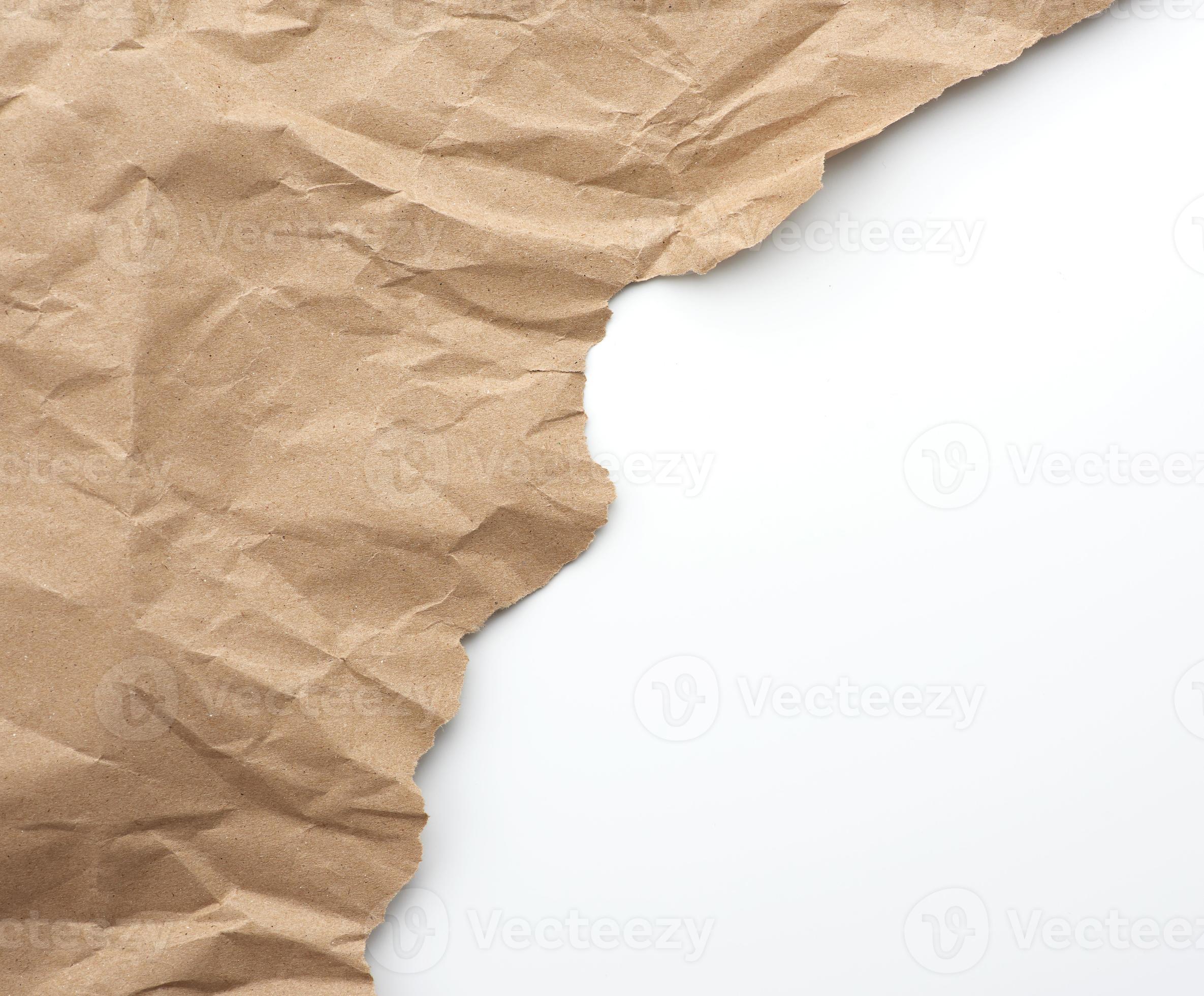 fragment of crumpled blank sheet of brown wrapping kraft paper with torn  edges 18960444 Stock Photo at Vecteezy