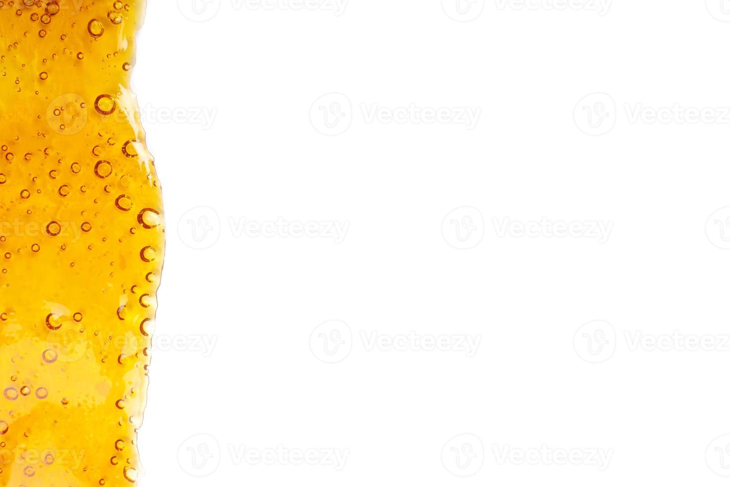 golden cannabis wax texture mockup for text on white background photo