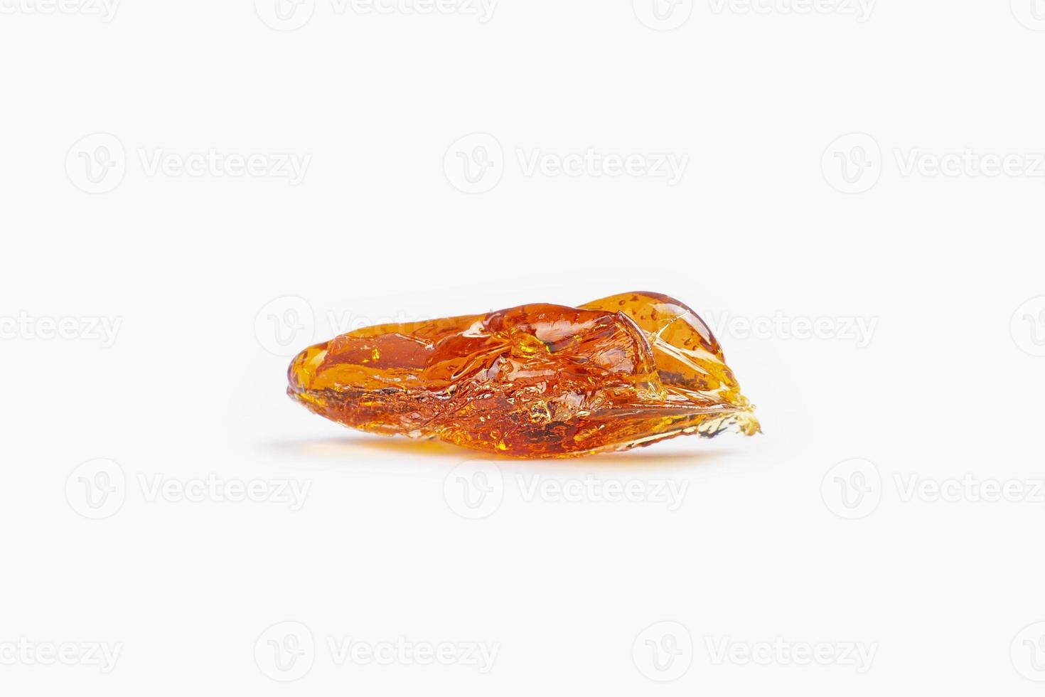 piece of smoking resin cannabis isolated on white background photo