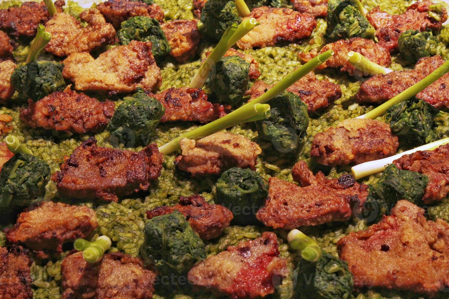 Homemade cuisine delicious beef meat with spinach and green vegetables. Appetizing dish. Healthy food concept. Top view, copy space, close up photo
