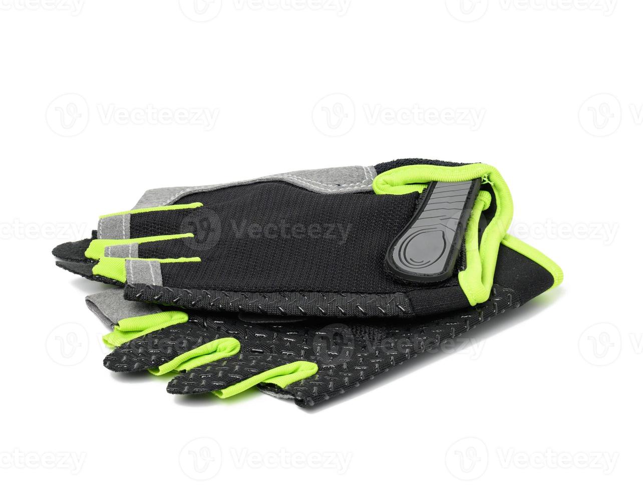 black textile sports gloves for fitness training and cycling isolated on white background photo