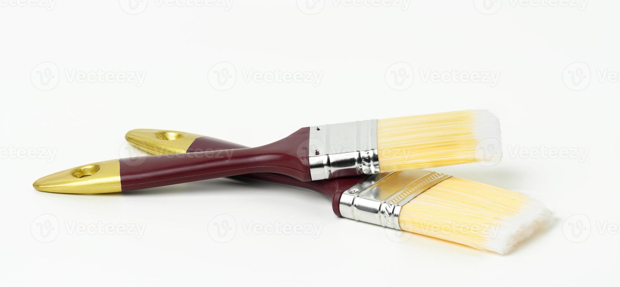 soft paint brush on wooden handle on white background photo