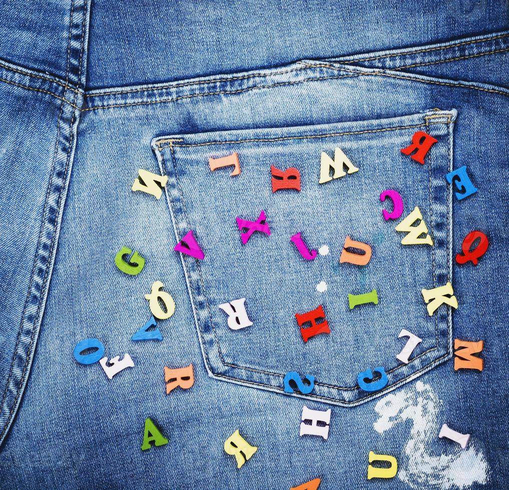 multicolored wooden letters of the English alphabet photo