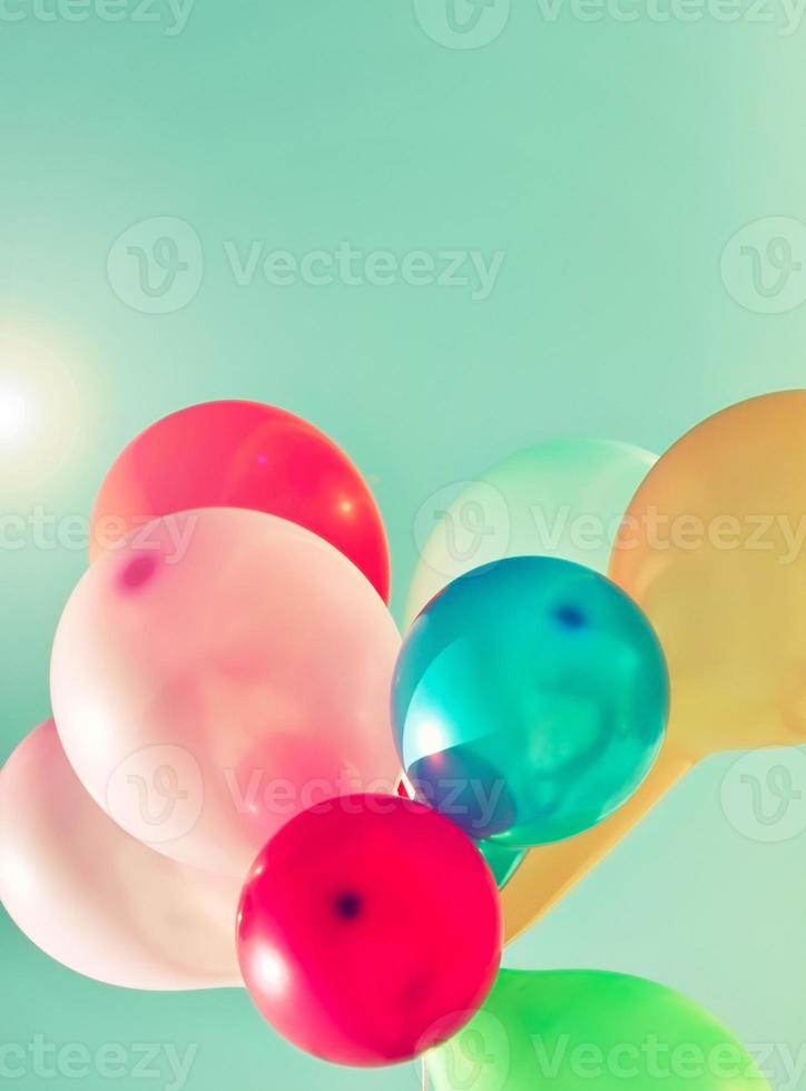 Multicolored balloons in the sun photo