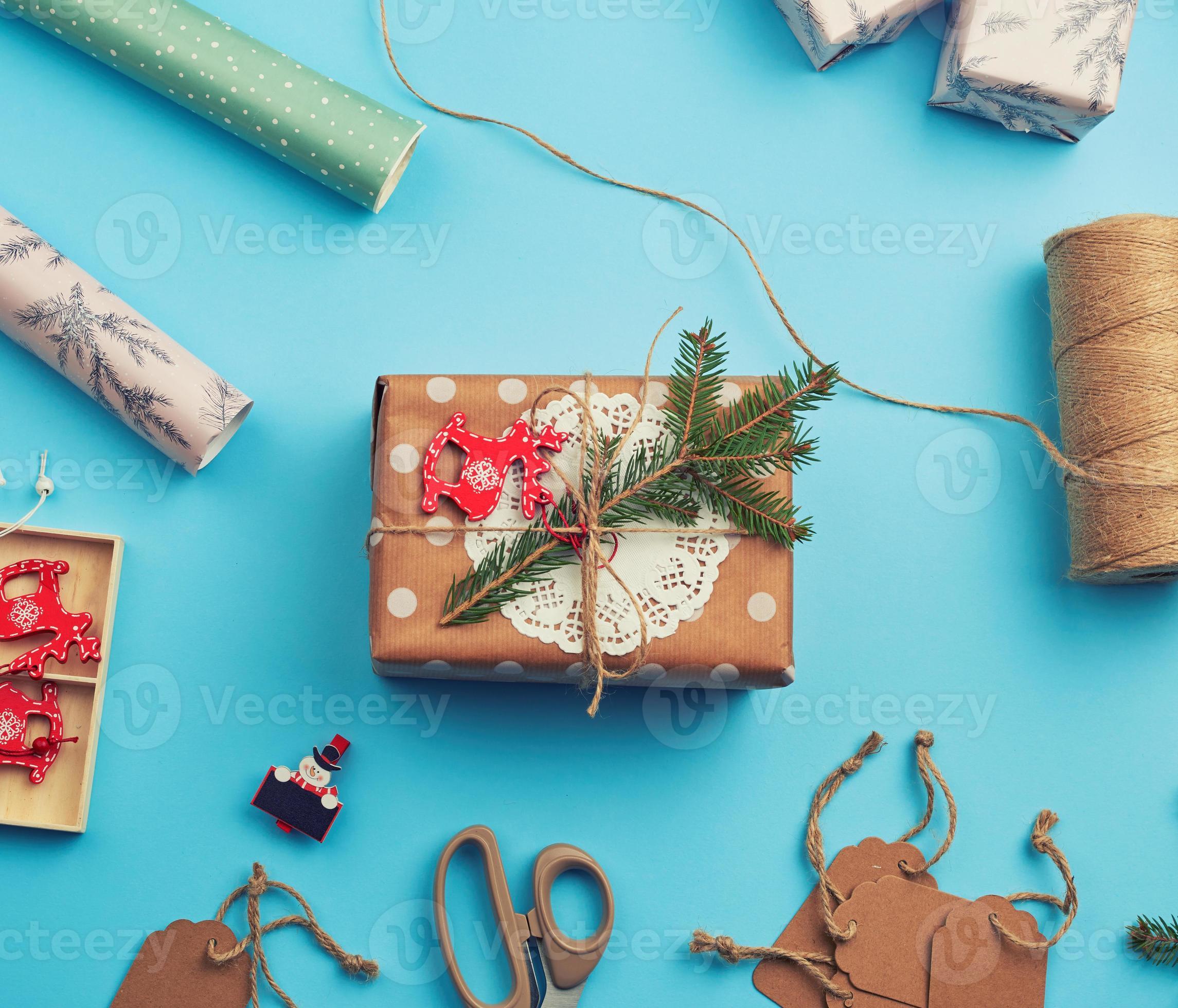roll of wrapping paper, decor, spruce branches, Christmas toys and
