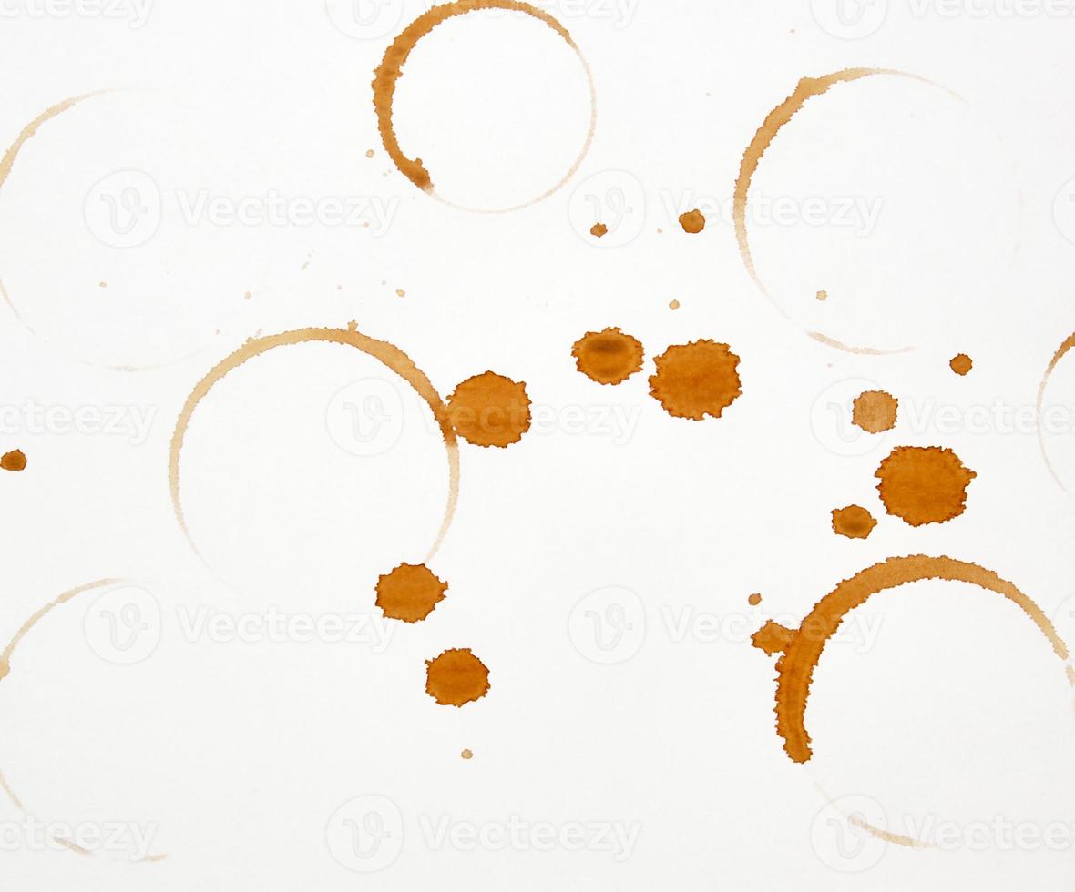 lot of round imprint from a coffee cup on a white paper background photo