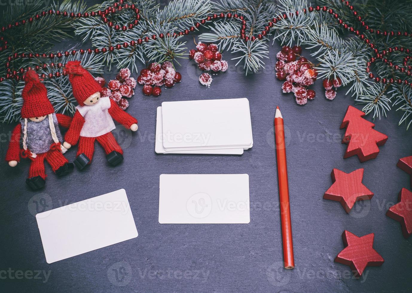 blank white paper business cards on a black background photo