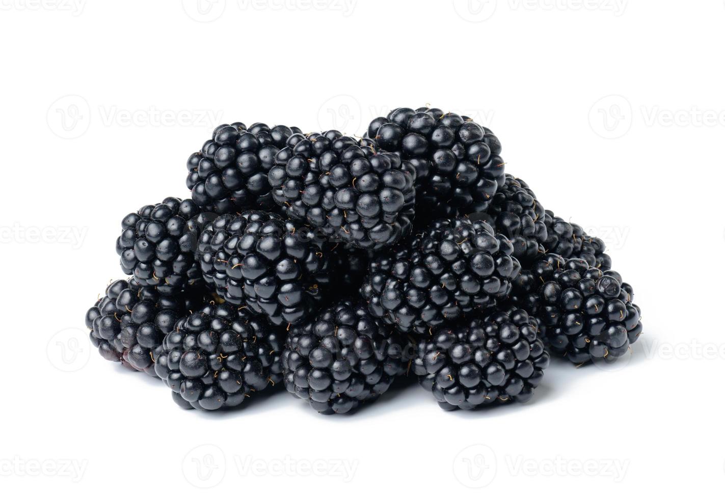 A bunch of ripe blackberries on a white isolated background photo