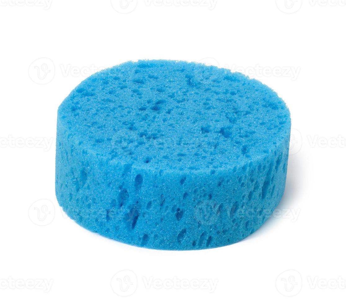 round blue bath sponge isolated on white background photo