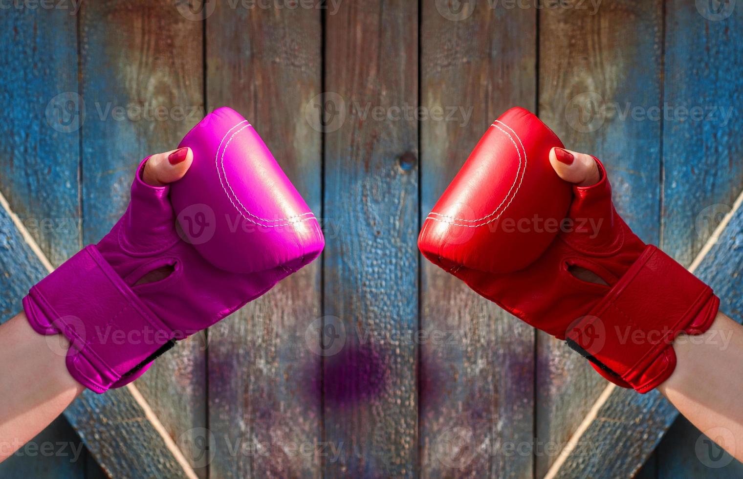 Two female hands in  boxing gloves photo