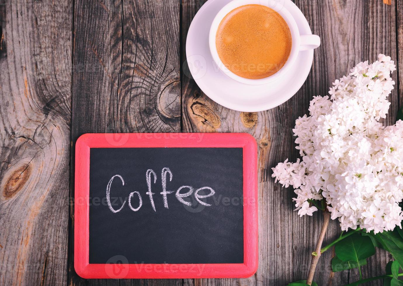 Black chalkboard with the inscription of coffee photo