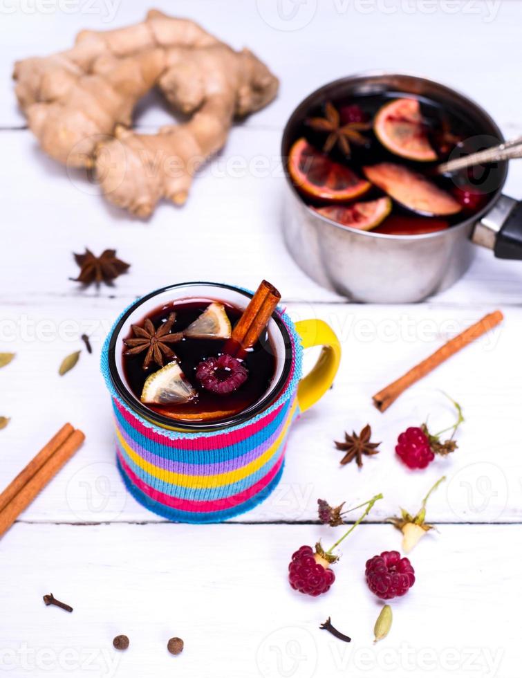 mulled wine in a yellow mug photo