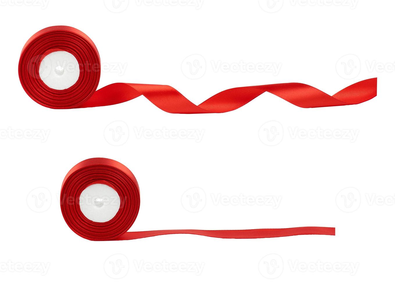 set of untwisted coils of red satin ribbon isolated on a white background photo