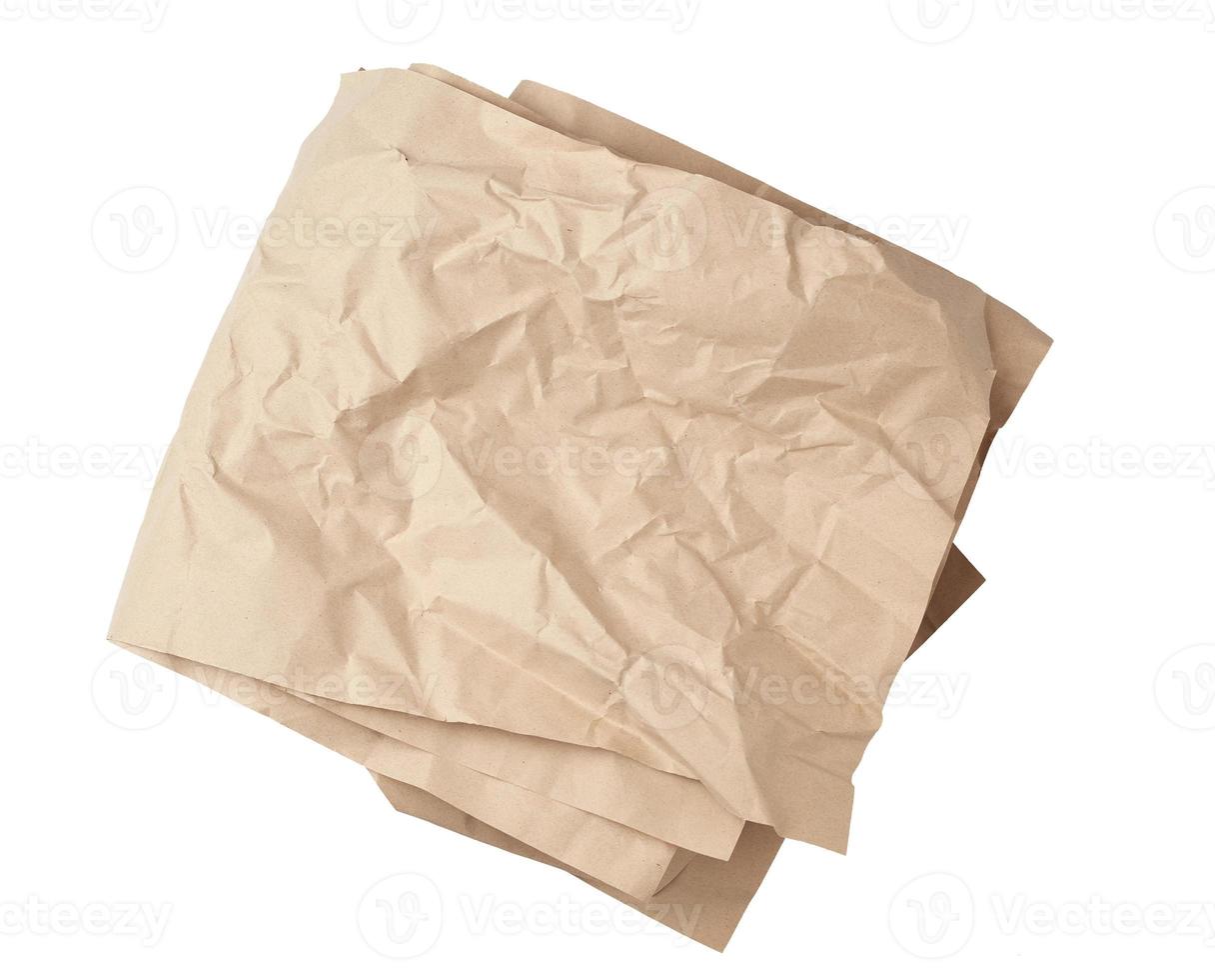 folded blank brown kraft paper sheet isolated on white background photo