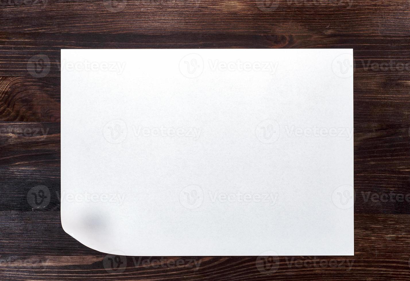 White sheet of paper with a curved bottom corner photo