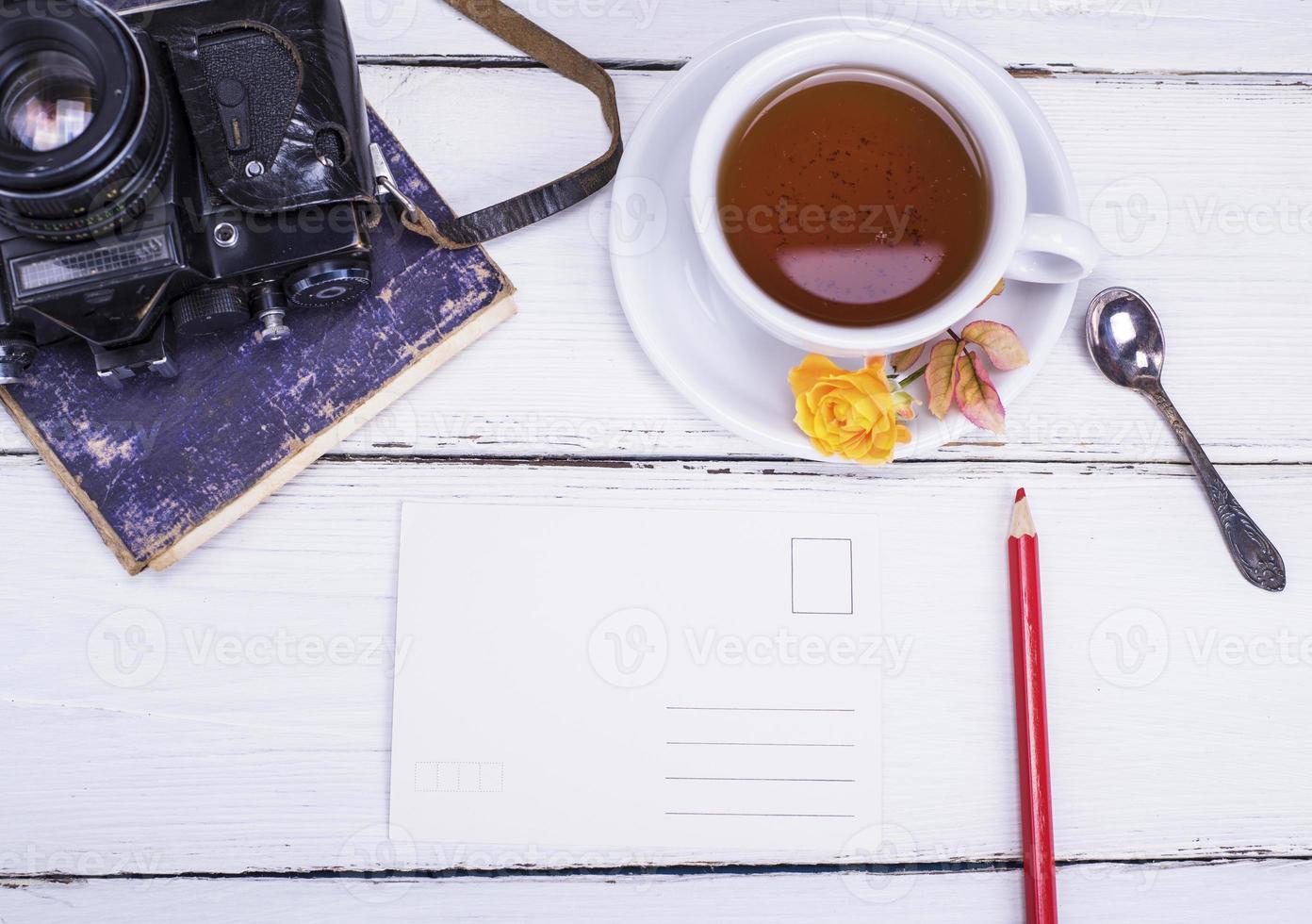 black tea in a white round cup photo