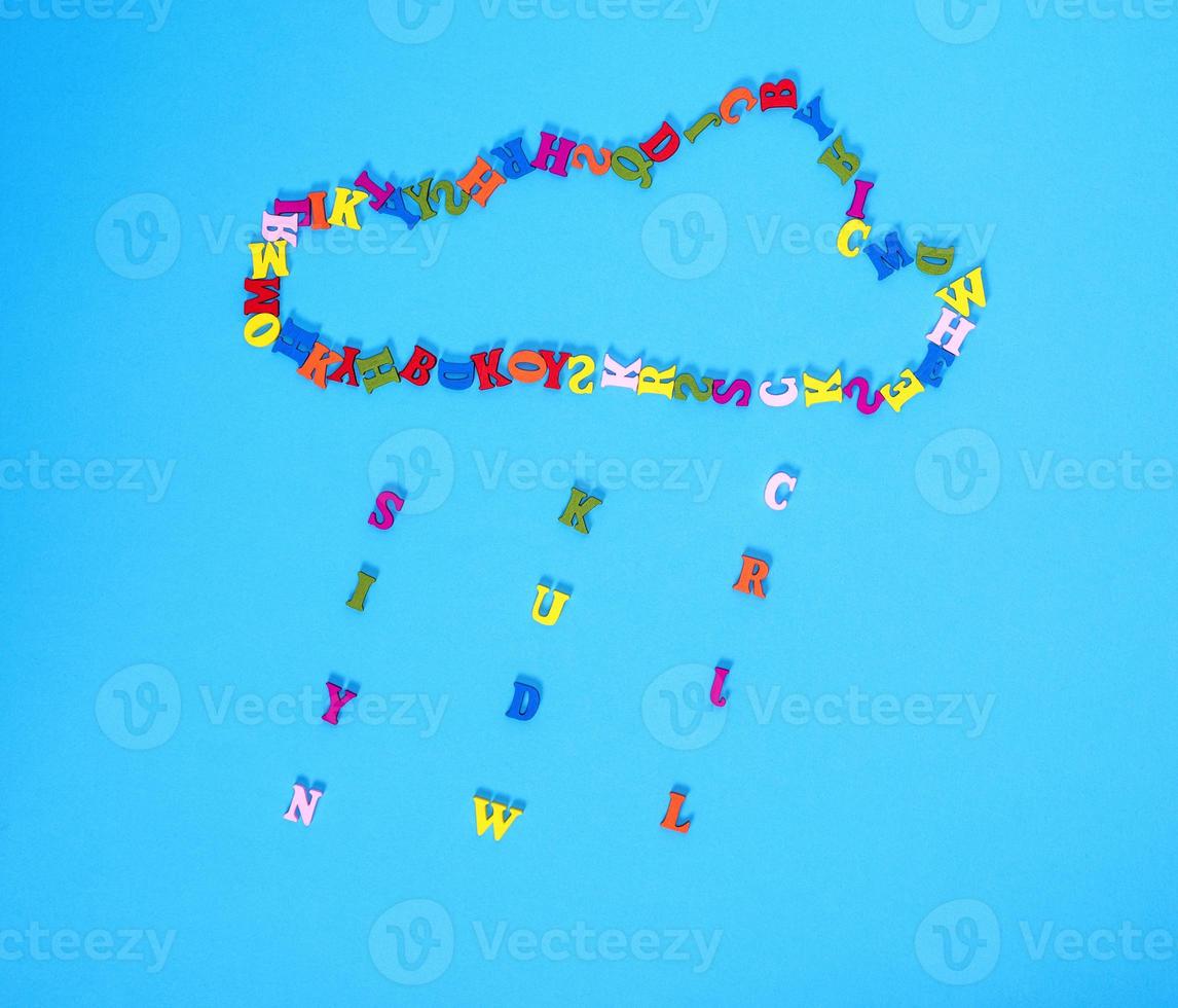 figure of a cloud of multi-colored wooden letters photo