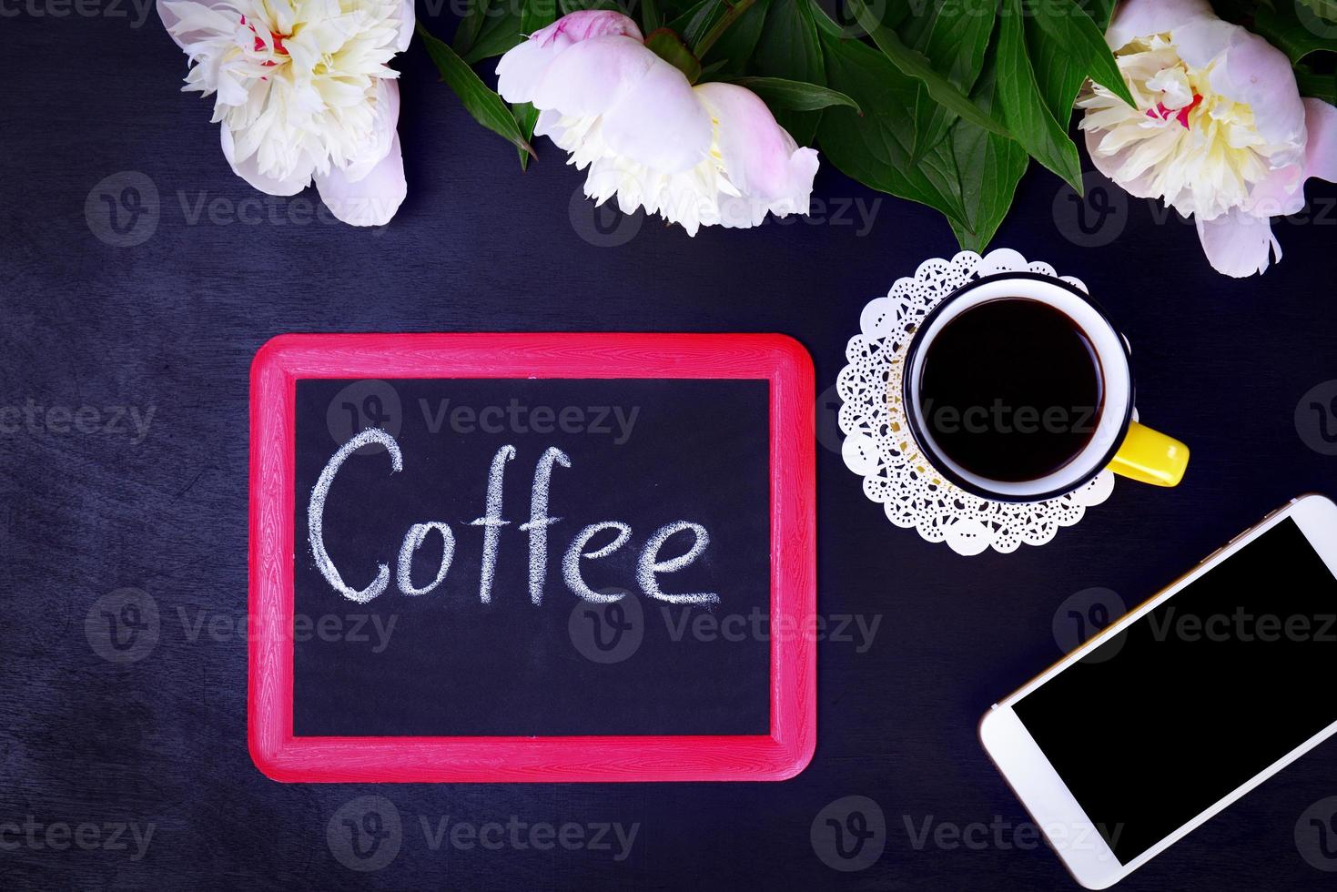 Black chalkboard with an inscription of coffee photo