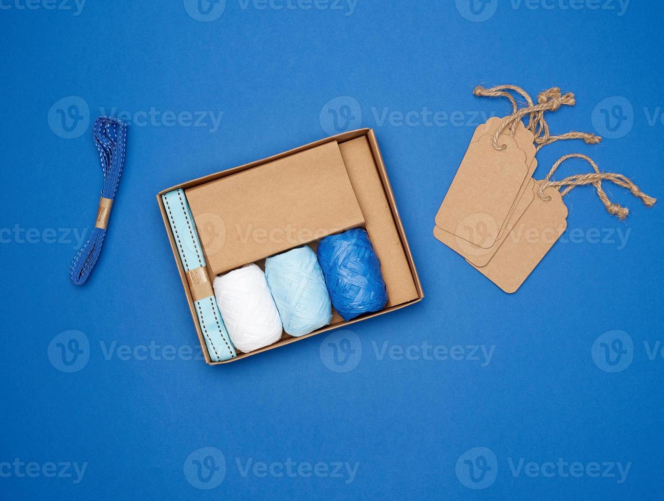 set for packing holiday gifts on a blue background photo