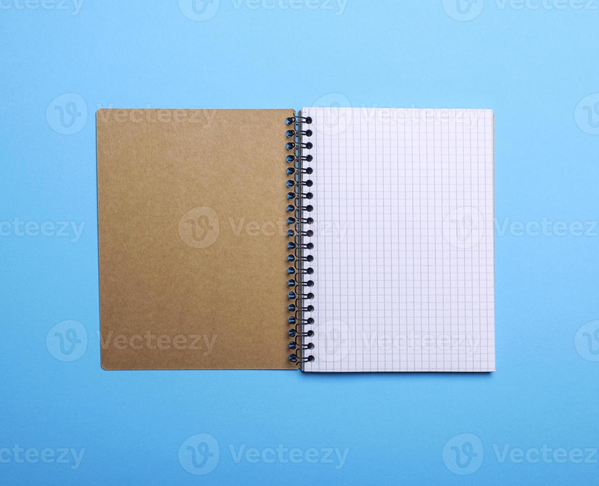 open blank notebook in a box photo