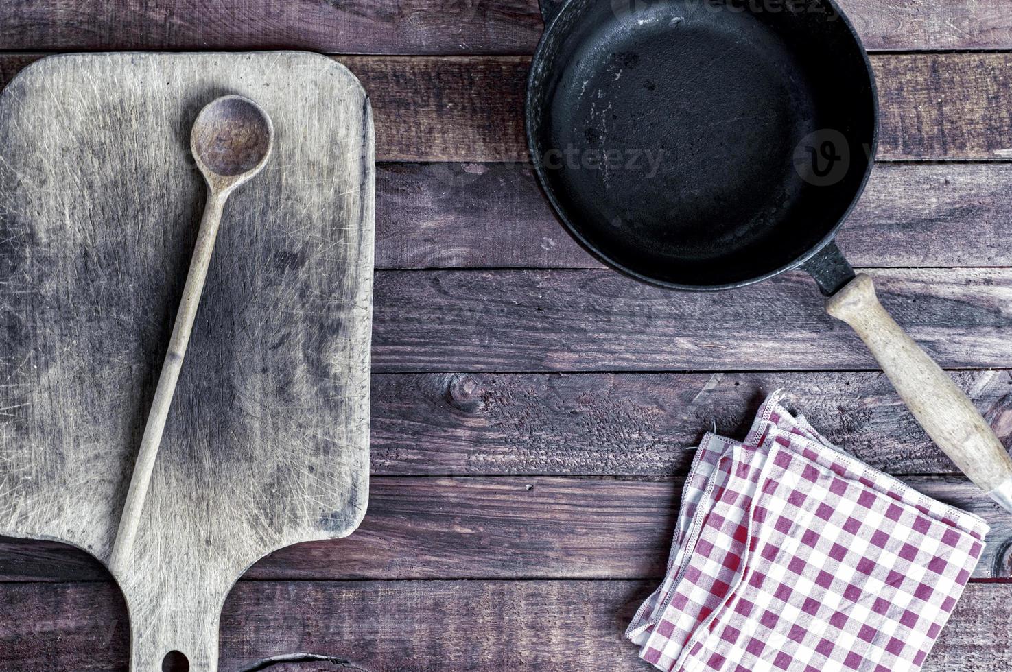 Empty black cast-iron frying pan photo