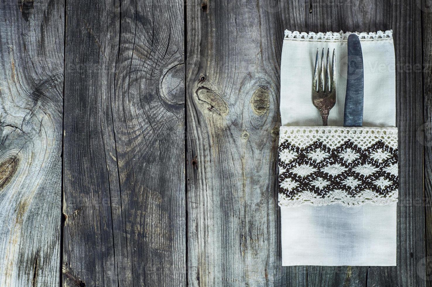Cutlery fork and knife decorated with vintage cloth photo