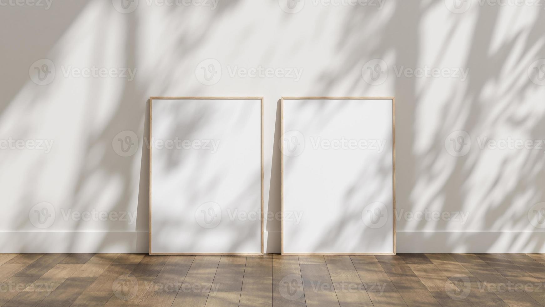 Frame poster mockup on wooden floor with white wall and sunlight shadow overlay photo