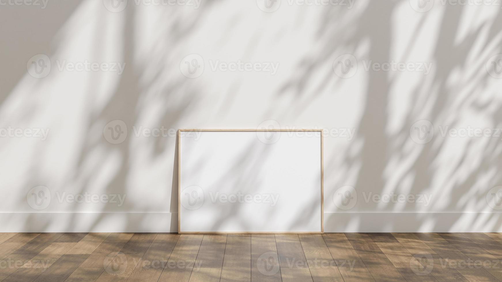 Frame poster mockup on wooden floor with white wall and sunlight shadow overlay photo