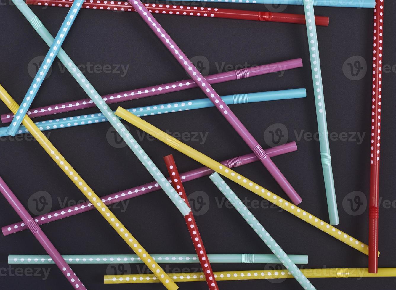 plastic tubes in a white polka-dot for drinks photo