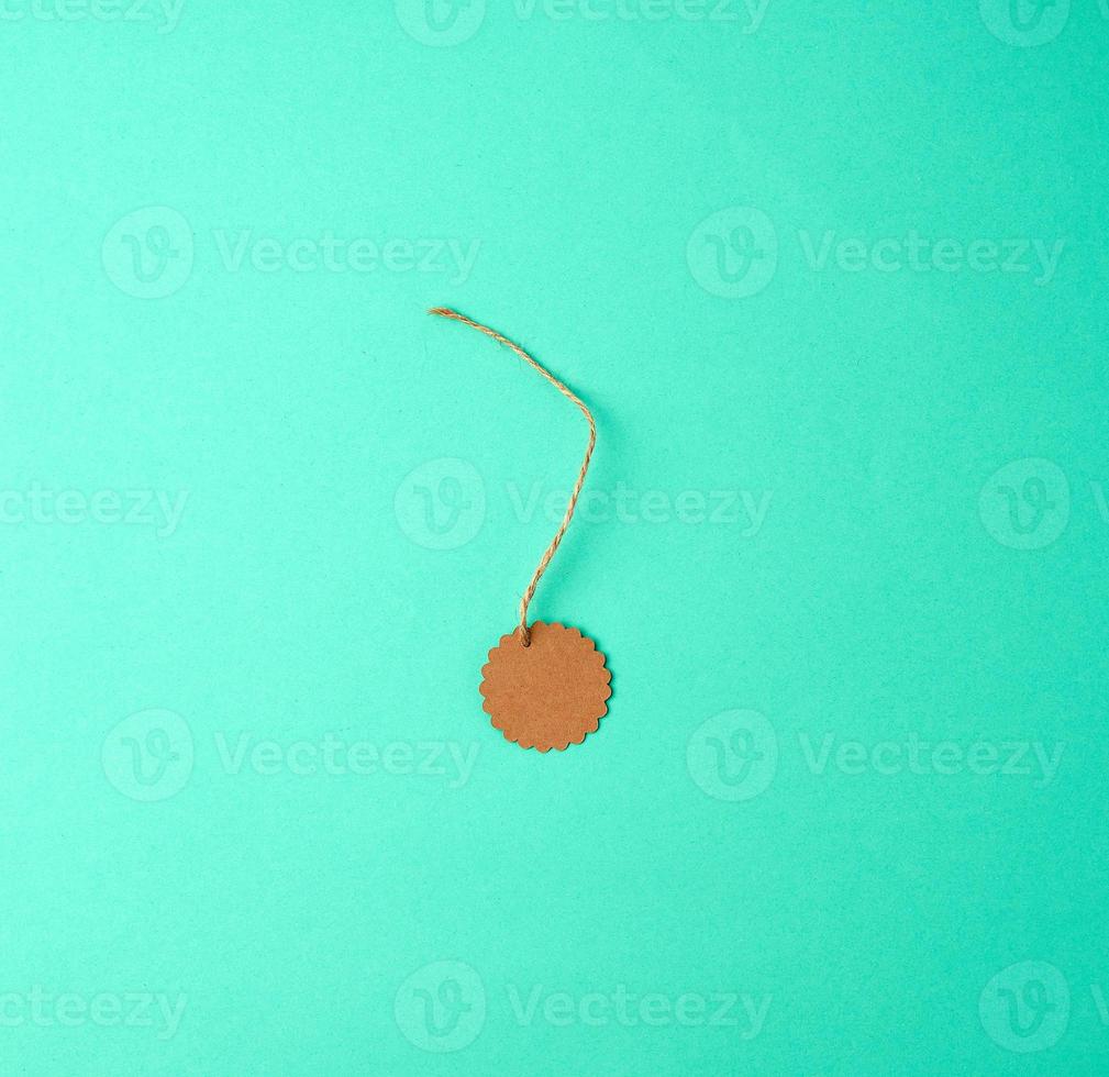 empty round brown tag on a rope photo