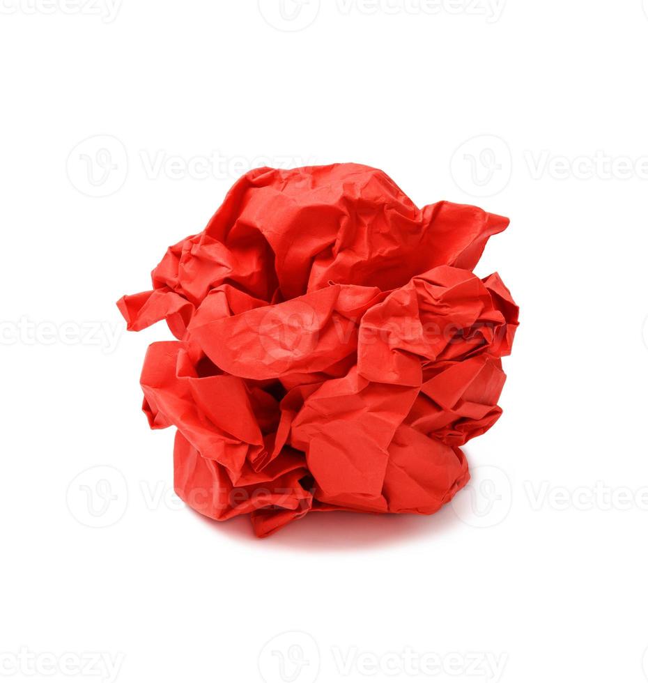 red crumpled ball of paper isolated on white background photo