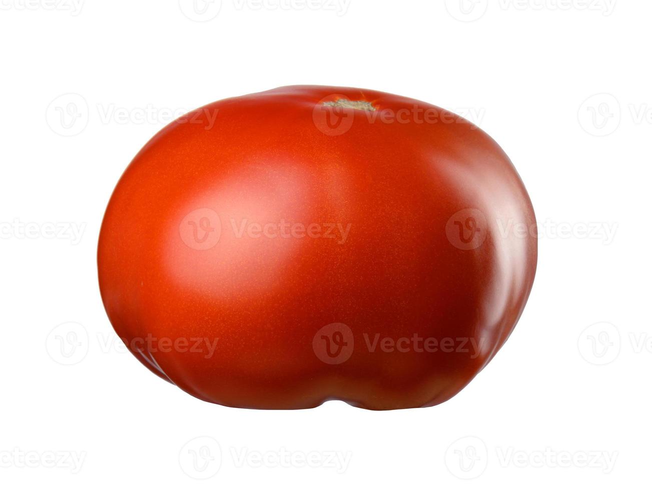 Ripe red tomato on a white background. Autumn harvest photo