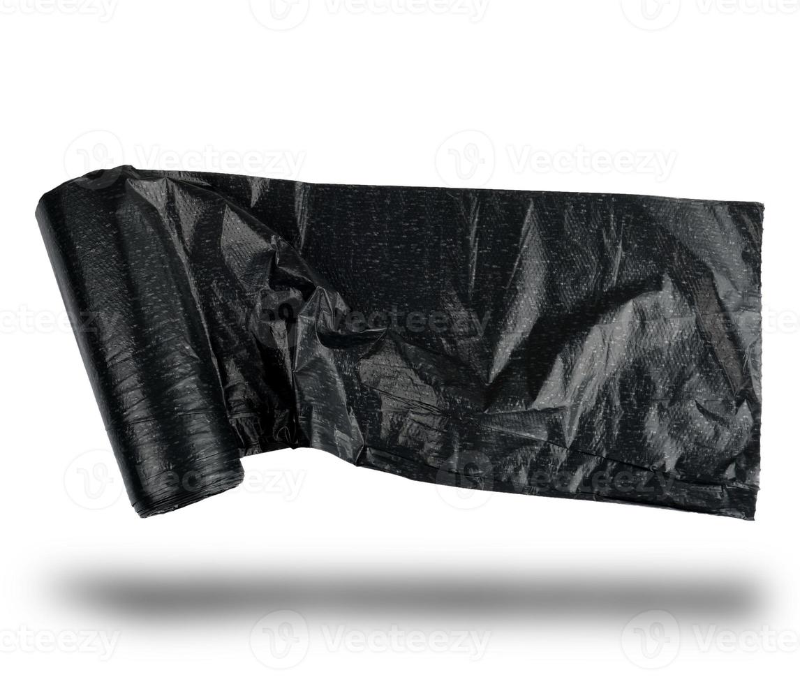 roll black plastic bag for garbage on a white background photo