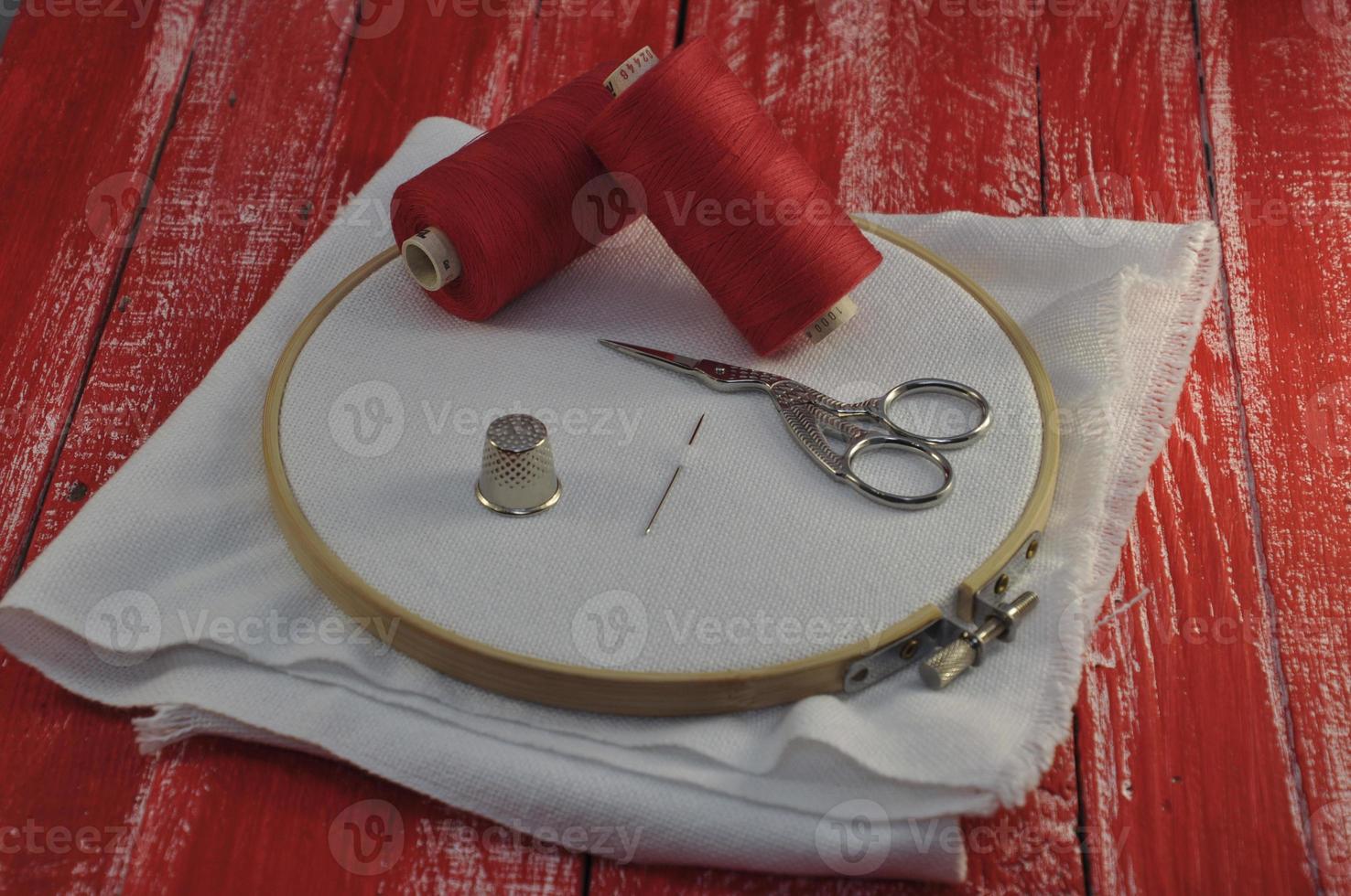 Two coils of red thread for the embroidery in the hoop photo
