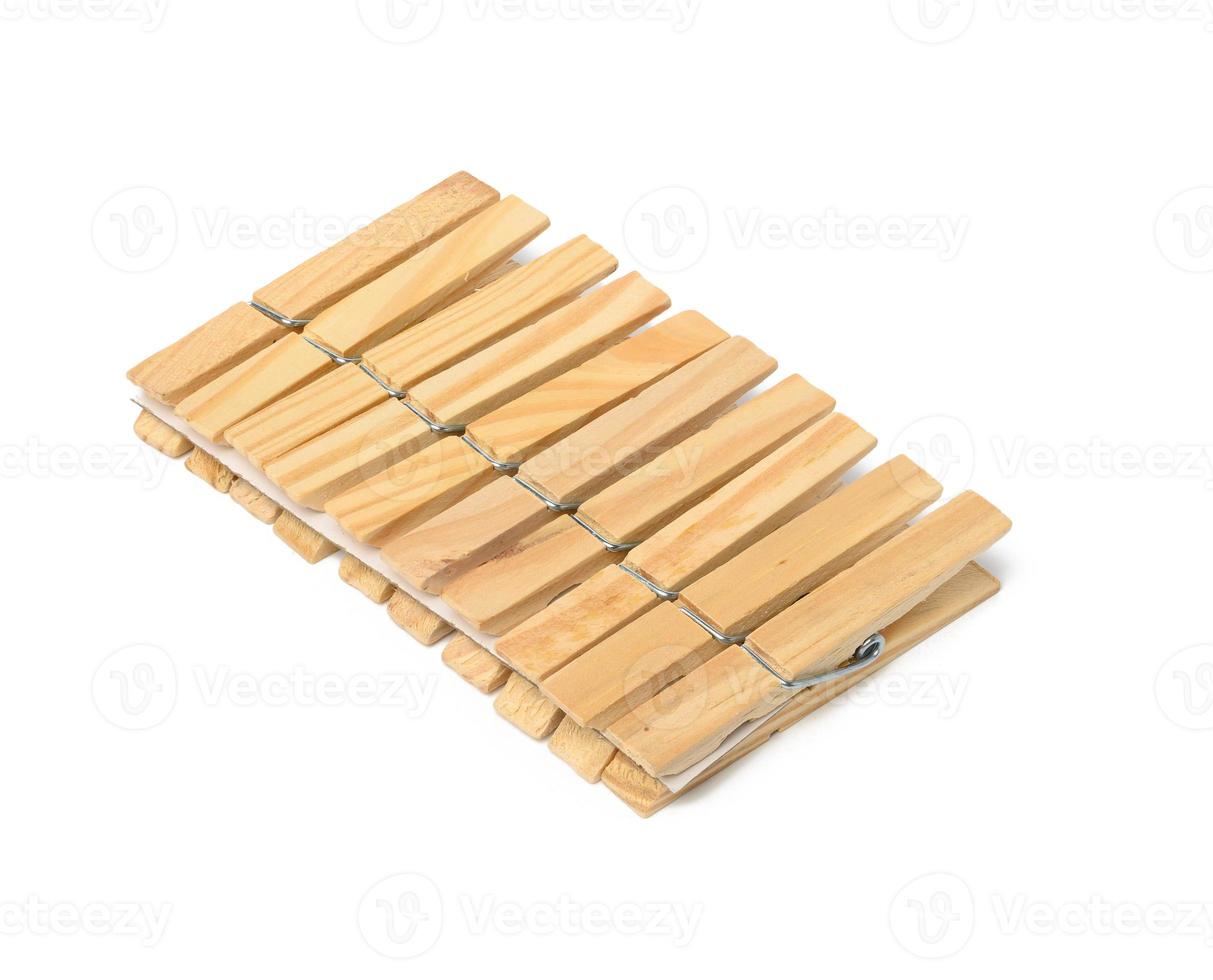 wooden clothespins isolated on white background photo