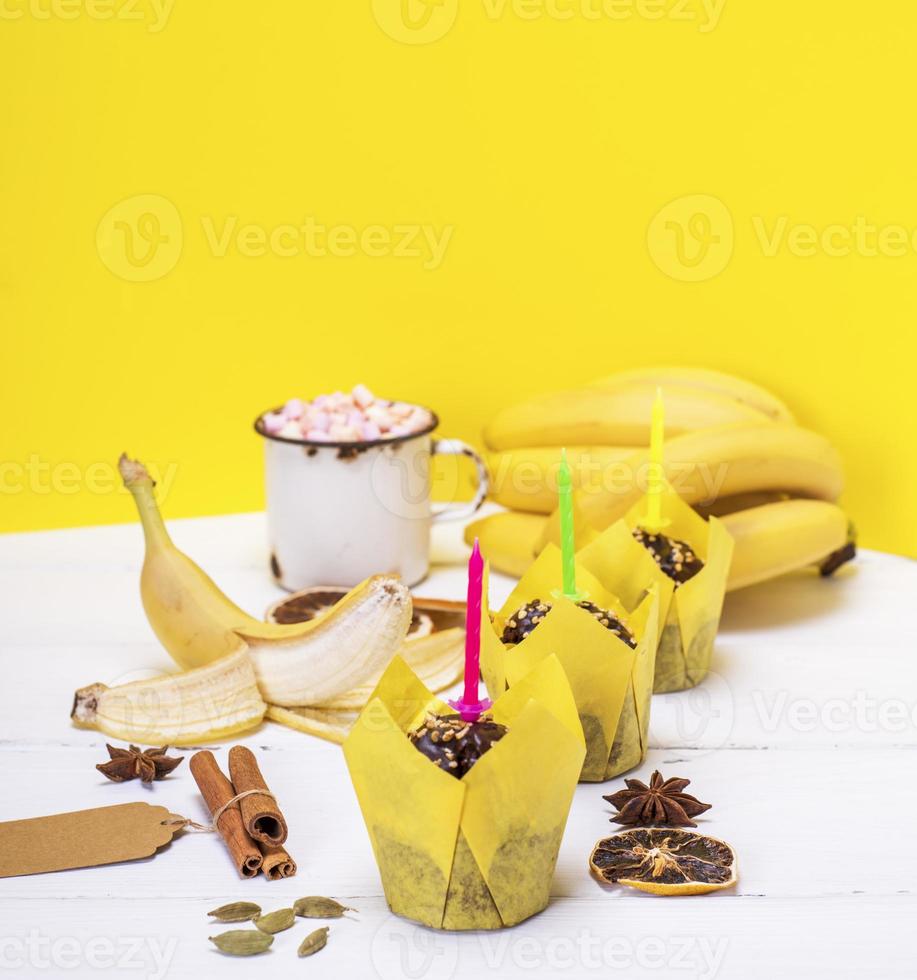banana muffins with festive candles photo